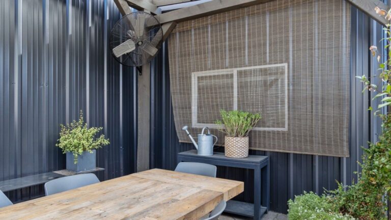 A newly painted commercial interior area with a table and chairs
